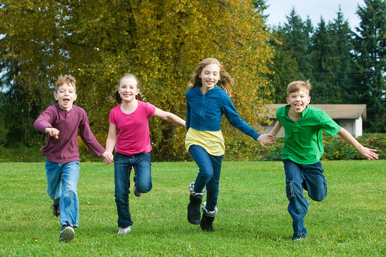 Children Running while holding hands