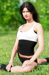 Woman doing stretching exercise. Yoga