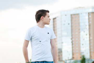 Fototapeta premium Portrait of young attractive man at park