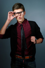 Fototapeta premium Fashion portrait of young man with glasses