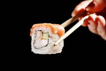 Sushi with chopsticks