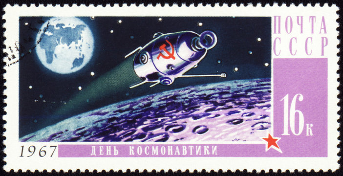 Post stamp with russian spaceship on Moon orbit