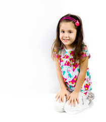 child behind a white board