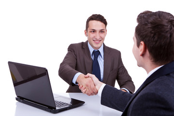 business men reaching to an agreement