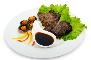 Steak with sauce in the plate