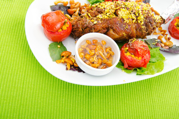 Lamb leg served in the plate