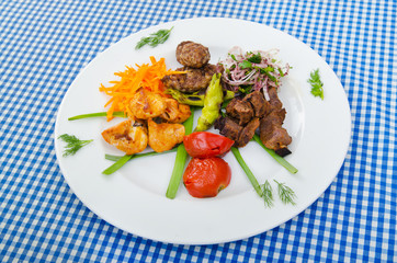 Plate with tasty lamp kebabs