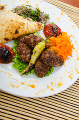 Meat cuisine - kebab served in plate