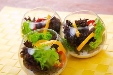 Fresh healthy salad in bowls