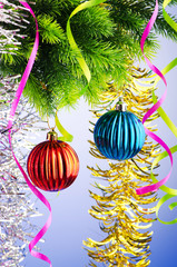 Baubles on christmas tree in celebration concept