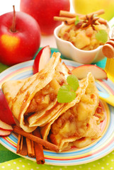 pancakes with stewed apples ,raisins and honey