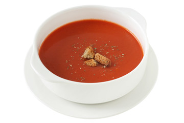tomato soup in white bowl
