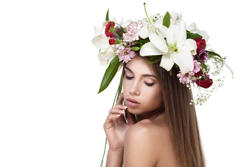 Beautiful woman with flower wreath. Space for text.