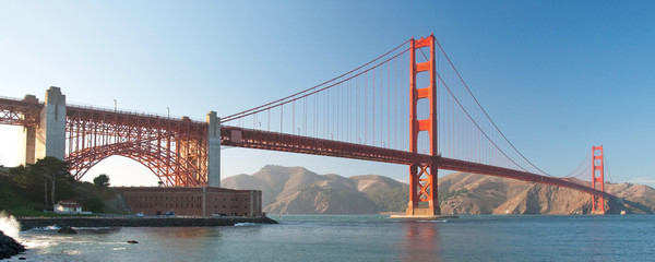 The Golden Gate Bridge in San Francisco during the sunset panora