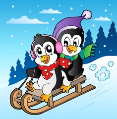 Obraz premium Winter scene with penguins sledging