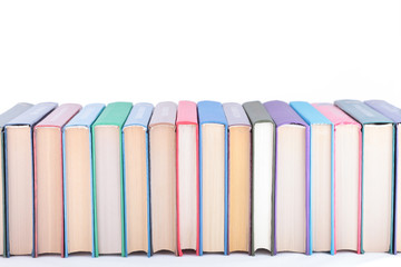 Books of different colours  isolated.