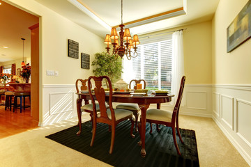 Elegant dining room with decorated table for fall dinner