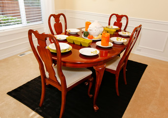 Dining room table ith plates for the fall dinner