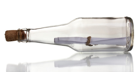 Glass bottle with note inside isolated on white
