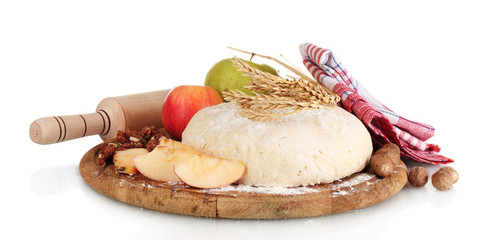 ingredients for homemade pie on wooden plate isolated on white