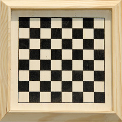 Framed checkers or chess board.