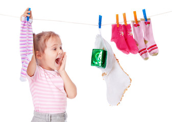 beautiful girl hangs socks