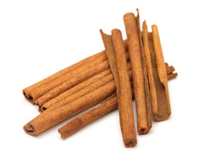 photo of cinnamon on white background