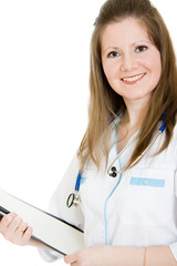 Female doctor writing on the document plate