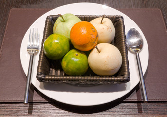 fruits in basket on dish