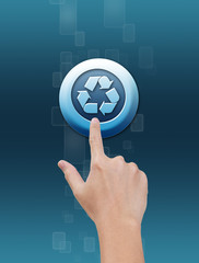 Hand choosing recycle symbol button