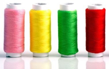 Set of colorful spools of thread