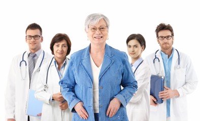 Senior patient in front of medical team
