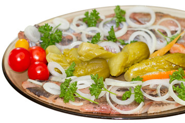 Herring with an onions and pickled vegetables