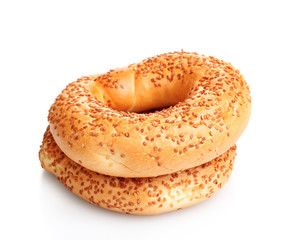 delicious bagels with sesame seeds isolated on white