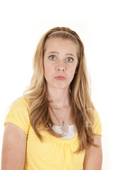 girl yellow shirt sad