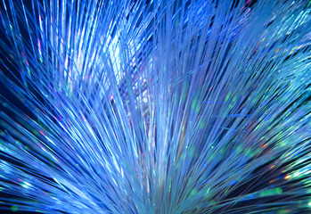 Obraz premium Tło światłowodowe z dużą ilością plam świetlnych.
