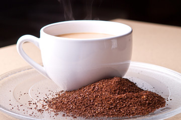 Cup of coffee with grounds