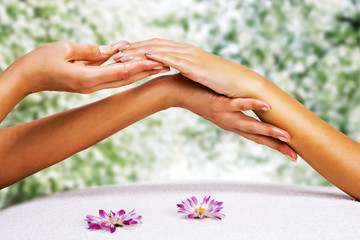 Hands massage in the spa salon