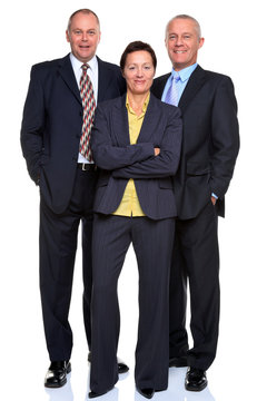 Mature business team isolated on white
