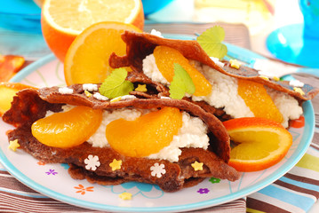 chocolate pancakes with cottage cheese and tangerines