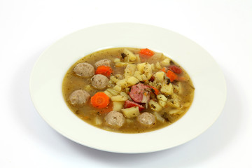 Eintopf auf weißem Teller