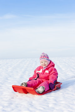 little girl with bob in snow