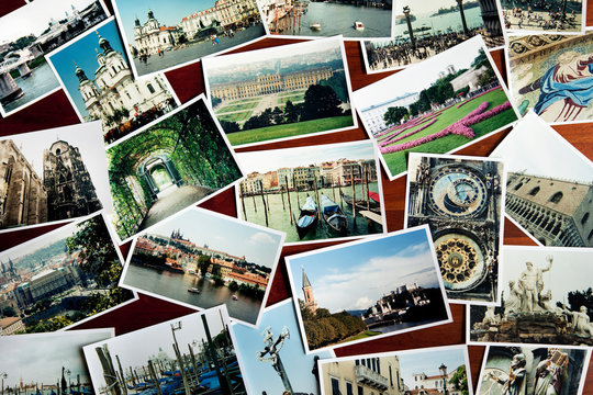 European travel photos spread out on a table
