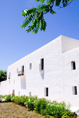 Fototapeta na wymiar Ibiza white church in Sant Carles Peralta