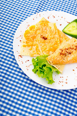 Pancake with pumpkin in plate