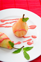 Dessert with pear in sauce