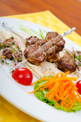 Meat cuisine - kebab served in plate