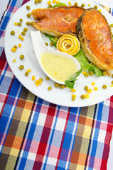 Roasted salmon in the plate