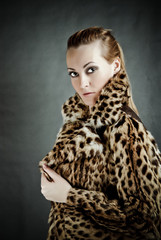Attractive woman in fur coat