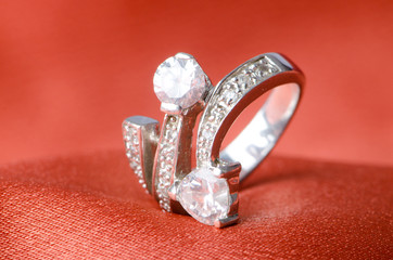 Fashion concept with ring on background